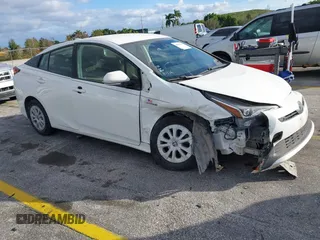 2020 Toyota Prius L Eco with VIN JTDKARFU5L3121386, listed as a IAAI auction lot 40989001 with 94,025 mi miles and . Bid and sale history available at DreamBid. Image 1.