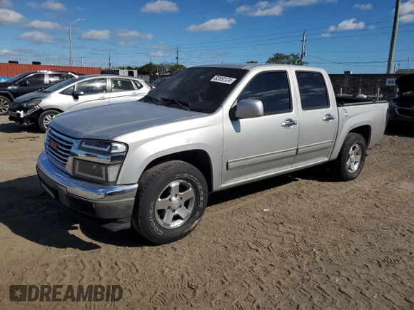 2012 GMC Canyon SLE1 with VIN 1GTD5MFE9C8108474, listed as a Copart auction lot 82650124 with 219,772 mi miles and Salvage Title. Bid and sale history available at carsss.com. Image 1.