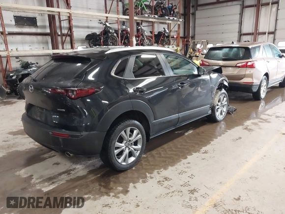 2022 Mazda CX-30 2.5 S Select Package with VIN 3MVDMBBL8NM430516, listed as a IAAI auction lot 41676856 with 36,450 mi miles. Bid and sale history available at carsss.com. Image 4.