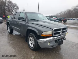 2001 Dodge Dakota Sport with VIN 1B7HG2AN51S348161, listed as a IAAI auction lot 41690779 with 148,484 mi miles. Bid and sale history available at carsss.com. Image 1.