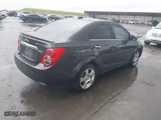 2015 Chevrolet Sonic LTZ with VIN 1G1JE5SB9F4125297, listed as a IAAI auction lot 41920118 with 99,928 mi miles. Bid and sale history available at carsss.com. Image 4.
