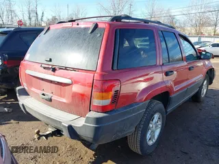 2003 Jeep Grand Cherokee Laredo with VIN 1J4GX48S13C594893, listed as a IAAI auction lot 41688597 with 179,680 mi miles. Bid and sale history available at carsss.com. Image 4.
