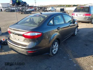 2015 Ford Fiesta SE with VIN 3FADP4BJ7FM132873, listed as a IAAI auction lot 41812405 with 180,522 mi miles. Bid and sale history available at carsss.com. Image 4.