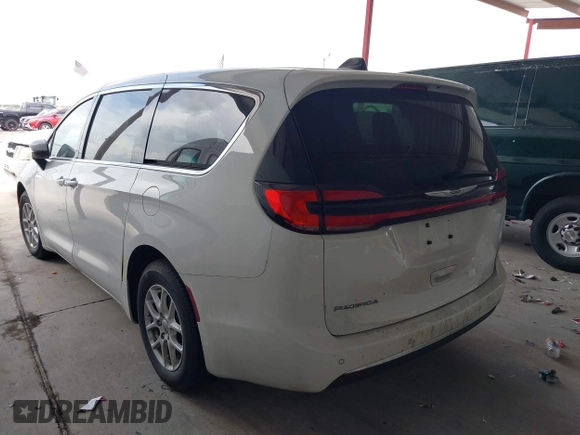 2023 Chrysler Pacifica Touring L with VIN 2C4RC1BG6PR550575, listed as a IAAI auction lot 42576498 with 54,373 mi miles and . Bid and sale history available at DreamBid. Image 3.