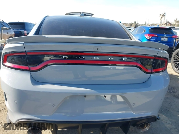 2021 Dodge Charger GT with VIN 2C3CDXHG7MH603660, listed as a IAAI auction lot 41910624 with 49,394 mi miles and . Bid and sale history available at DreamBid. Image 16.
