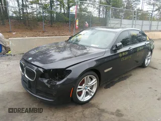 2013 BMW 7 Series 750Li xDrive with VIN WBAYF8C51DD140657, listed as a IAAI auction lot 32751348 with 128,816 mi miles. Bid and sale history available at carsss.com. Image 2.