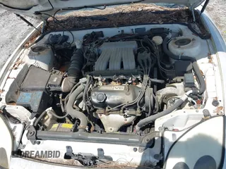 1997 Mitsubishi 3000GT z VIN JA3AM44H8VY006247, wystawiony jako IAAI lot #42233155 z przebiegiem 135 479 mil mil oraz . Historia ofert i sprzedaży dostępna na DreamBid. Obrazek 10.