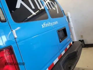 2013 Ford Econoline Cargo Commercial with VIN 1FTNE2EL1DDB26372, listed as a IAAI auction lot 42787142 with 117,378 mi miles and . Bid and sale history available at DreamBid. Image 7.