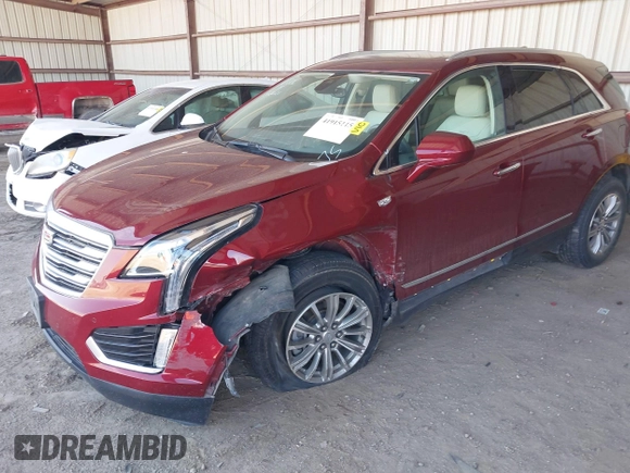 2017 Cadillac XT5 Luxury AWD with VIN 1GYKNDRS5HZ265570, listed as a IAAI auction lot 41915115 with 96,493 mi miles and . Bid and sale history available at DreamBid. Image 2.