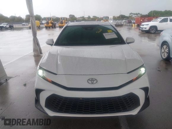 2025 Toyota Camry LE with VIN 4T1DAACK6SU531129, listed as a IAAI auction lot 41969220 with 10,542 mi miles and . Bid and sale history available at DreamBid. Image 6.