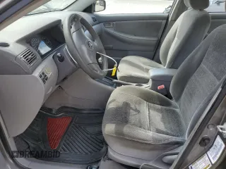 2004 Toyota Corolla CE with VIN 1NXBR32E24Z304630, listed as a Copart auction lot 56043555 with 159,342 mi miles and Salvage Title. Bid and sale history available at DreamBid. Image 7.