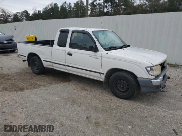 1999 Toyota Tacoma z VIN 4TAVL52N6XZ555376, wystawiony jako Copart lot #85763154 z przebiegiem 229 914 mil mil oraz Nie do naprawy • Non repairable. Historia ofert i sprzedaży dostępna na DreamBid. Obrazek 4.