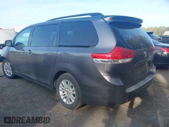 2011 Toyota Sienna XLE AAS with VIN 5TDYK3DC2BS093980, listed as a IAAI auction lot 42064568 with 196,893 mi miles. Bid and sale history available at carsss.com. Image 3.