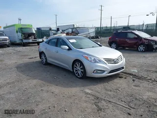 2013 Hyundai Azera with VIN KMHFH4JG9DA323254, listed as a IAAI auction lot 41776183 with 73,489 mi miles. Bid and sale history available at carsss.com. Image 1.