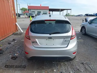 2014 Ford Fiesta SE with VIN 3FADP4EJ0EM215958, listed as a IAAI auction lot 42001168 with 115,231 mi miles and . Bid and sale history available at DreamBid. Image 16.