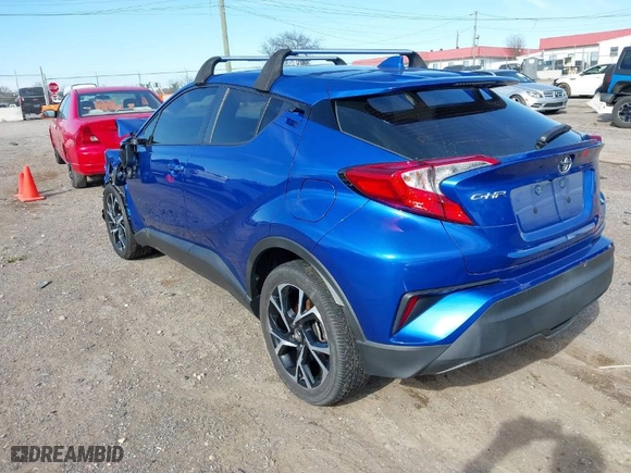 2019 Toyota C-HR XLE with VIN NMTKHMBX2KR091404, listed as a IAAI auction lot 41825675 with 64,255 mi miles. Bid and sale history available at carsss.com. Image 3.