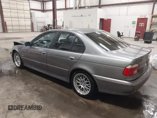 2003 BMW 5 Series 530iA with VIN WBADT63433CK45644, listed as a IAAI auction lot 41850399 with 178,600 mi miles. Bid and sale history available at carsss.com. Image 3.