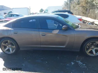 2013 Dodge Charger SE with VIN 2C3CDXBG2DH609438, listed as a IAAI auction lot 41649615 with 236,024 mi miles. Bid and sale history available at carsss.com. Image 14.