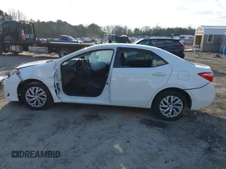 2019 Toyota Corolla L with VIN 5YFBURHEXKP934032, listed as a IAAI auction lot 41247557 with 95,560 mi miles. Bid and sale history available at carsss.com. Image 15.