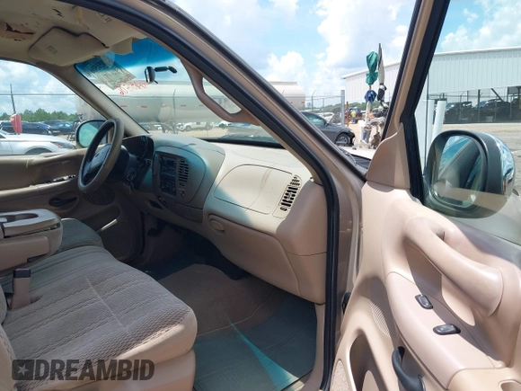 1998 Ford F-150 with VIN 1FTZX1760WNB21027, listed as a IAAI auction lot 42651506 with 189,442 mi miles and . Bid and sale history available at DreamBid. Image 5.