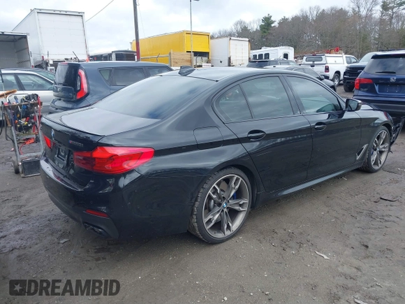 2020 BMW 5 Series M550i xDrive z VIN WBAJS7C09LCD45078, wystawiony jako IAAI lot #41850274 z przebiegiem 75 613 mil mil oraz . Historia ofert i sprzedaży dostępna na DreamBid. Obrazek 4.