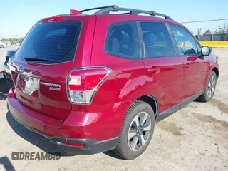 2017 Subaru Forester with VIN JF2SJABC2HH482648, listed as a IAAI auction lot 42140904 with 201,432 mi miles and . Bid and sale history available at DreamBid. Image 4.