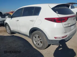 2018 Kia Sportage LX with VIN KNDPM3AC2J7445877, listed as a IAAI auction lot 41749884 with 150,320 mi miles and . Bid and sale history available at DreamBid. Image 3.
