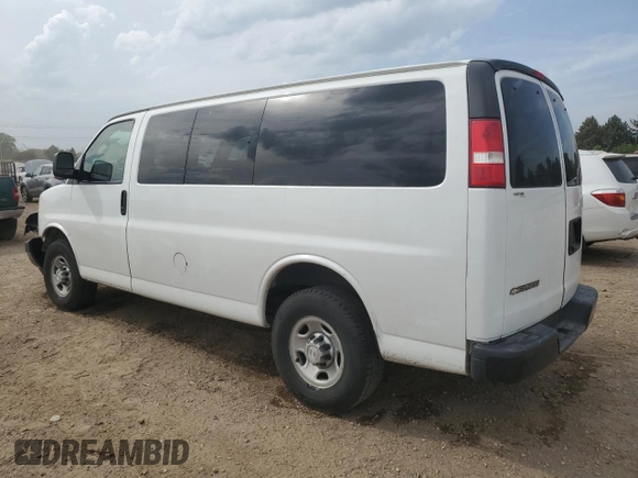 2018 Chevrolet Express Passenger LS with VIN 1GAWGEFG0J1212151, listed as a Copart auction lot 57289585 with 138,956 mi miles and Salvage title. Bid and sale history available at DreamBid. Image 2.