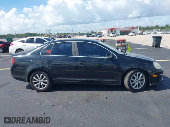 2010 Volkswagen Jetta Limited Edition z VIN 3VWRX7AJ4AM054934, wystawiony jako IAAI lot #42539609 z przebiegiem 245 048 mil mil oraz . Historia ofert i sprzedaży dostępna na DreamBid. Obrazek 13.