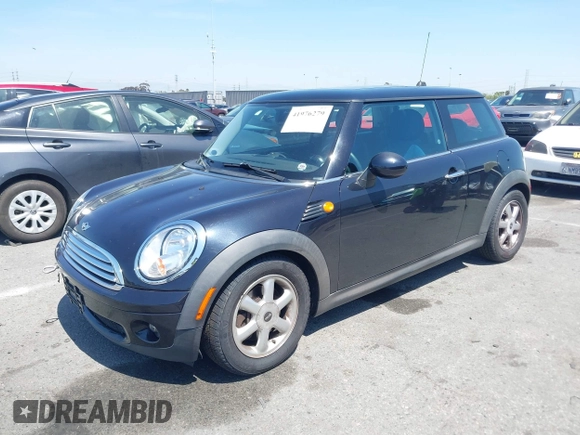 2008 MINI Hardtop with VIN WMWMF33538TT64168, listed as a IAAI auction lot 41976279 with 115,039 mi miles and . Bid and sale history available at DreamBid. Image 2.