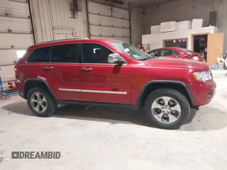 2011 Jeep Grand Cherokee Limited z VIN 1J4RR5GG7BC612091, wystawiony jako IAAI lot #41878511 z przebiegiem 127 114 mil mil oraz . Historia ofert i sprzedaży dostępna na DreamBid. Obrazek 13.