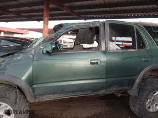 1999 Toyota 4Runner SR5 with VIN JT3HN86R0X0230192, listed as a IAAI auction lot 41279545 with 239,921 mi miles. Bid and sale history available at carsss.com. Image 14.