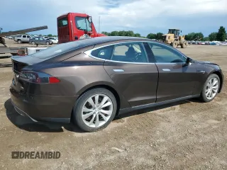 2014 Tesla Model S 60 with VIN 5YJSA1H17EFP31977, listed as a Copart auction lot 62521525 with Not provided miles and Clean title. Bid and sale history available at DreamBid. Image 3.
