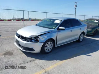 2013 Volkswagen Jetta Sedan SE with VIN 3VWDP7AJ8DM404855, listed as a IAAI auction lot 41949639 with 166,264 mi miles. Bid and sale history available at carsss.com. Image 2.