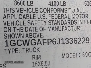 2018 Chevrolet Express Cargo Van with VIN 1GCWGAFP6J1336229, listed as a IAAI auction lot 42022722 with 99,005 mi miles. Bid and sale history available at carsss.com. Image 9.
