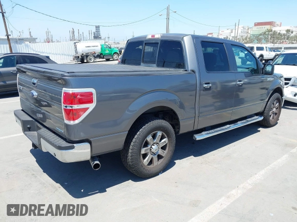 2013 Ford F-150 XL with VIN 1FTFW1CF2DKF20421, listed as a IAAI auction lot 42410211 with 112,970 mi miles and . Bid and sale history available at DreamBid. Image 4.
