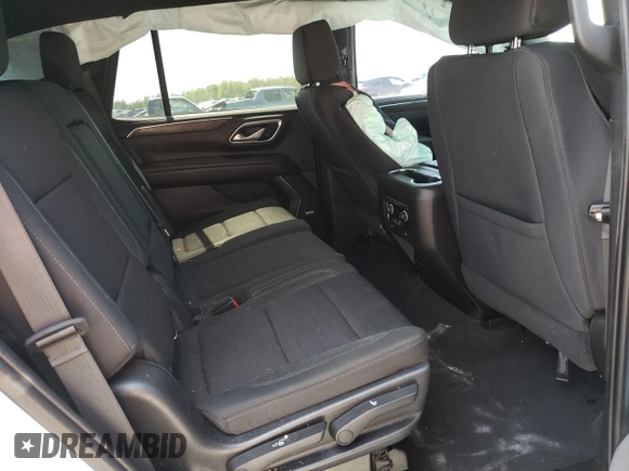 2021 Chevrolet Tahoe LS z VIN 1GNSKMKD0MR315982, wystawiony jako Copart lot #52740585 z przebiegiem 54 954 mil mil oraz Szkoda całkowita • Salvage title. Historia ofert i sprzedaży dostępna na DreamBid. Obrazek 11.