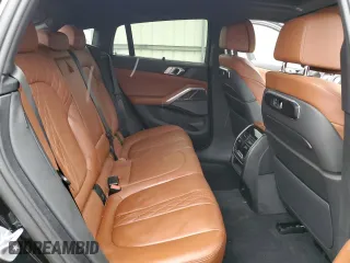 2025 BMW X6 M60i with VIN 5UX43EX02S9W76491, listed as a Copart auction lot 85033264 with 5,173 mi miles and Salvage Title. Bid and sale history available at carsss.com. Image 11.