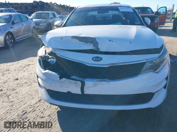 2016 Kia Optima LX with VIN 5XXGT4L36GG005859, listed as a IAAI auction lot 41053277 with 127,783 mi miles. Bid and sale history available at carsss.com. Image 6.