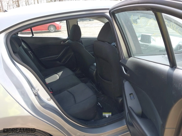 2016 Mazda Mazda3 i Sport with VIN JM1BM1T71G1335980, listed as a IAAI auction lot 42003186 with 131,015 mi miles. Bid and sale history available at carsss.com. Image 8.