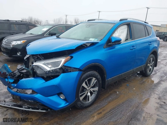 2017 Toyota RAV4 XLE with VIN 2T3RFREV2HW693031, listed as a IAAI auction lot 41671812 with 82,190 mi miles. Bid and sale history available at carsss.com. Image 17.