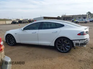 2012 Tesla Model S Performance with VIN 5YJSA1DP7CFS01032, listed as a IAAI auction lot 41423925 with 18,070 mi miles. Bid and sale history available at carsss.com. Image 14.