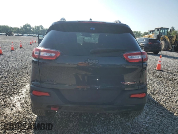 2017 Jeep Cherokee Trailhawk with VIN 1C4PJMBS0HW517406, listed as a Copart auction lot 61254315 with 99,284 mi miles and Clean title. Bid and sale history available at DreamBid. Image 6.