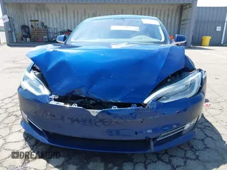 2017 Tesla Model S 100D with VIN 5YJSA1E44HF220391, listed as a IAAI auction lot 37381201 with Not Provided miles and . Bid and sale history available at DreamBid. Image 6.