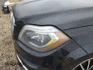 2014 Mercedes-Benz GL-Class GL 550 with VIN 4JGDF7DE1EA274612, listed as a IAAI auction lot 41710174 with 105,094 mi miles. Bid and sale history available at carsss.com. Image 20.