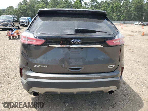 2020 Ford Edge SEL с VIN 2FMPK3J92LBA30123, выставлен на аукционе Copart как лот 63192805 с пробегом 119 534 миль миль и Списание • Salvage title. История ставок и продаж доступна на DreamBid. Изображение 6.