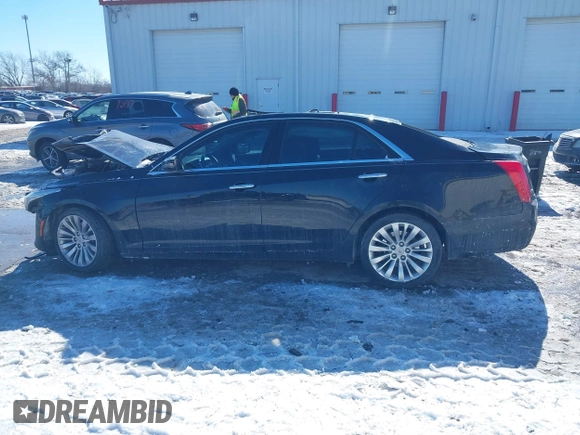 2014 Cadillac CTS Luxury AWD with VIN 1G6AX5SX3E0191673, listed as a IAAI auction lot 41617087 with 68,581 mi miles and . Bid and sale history available at DreamBid. Image 14.