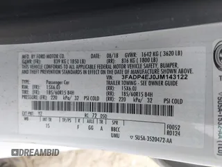 2018 Ford Fiesta SE with VIN 3FADP4EJ0JM143122, listed as a IAAI auction lot 42128666 with 146,747 mi miles and . Bid and sale history available at DreamBid. Image 9.