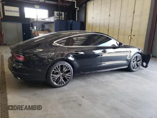 2016 Audi A7 3.0 Premium Plus with VIN WAUWGAFC5GN064672, listed as a Copart auction lot 71574044 with 64,927 mi miles and Salvage Title. Bid and sale history available at carsss.com. Image 3.
