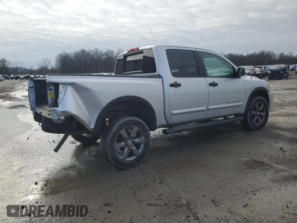 2015 Nissan Titan Pro-4X with VIN 1N6AA0EC1FN512072, listed as a Copart auction lot 85733174 with 92,460 mi miles and Salvage title. Bid and sale history available at DreamBid. Image 3.